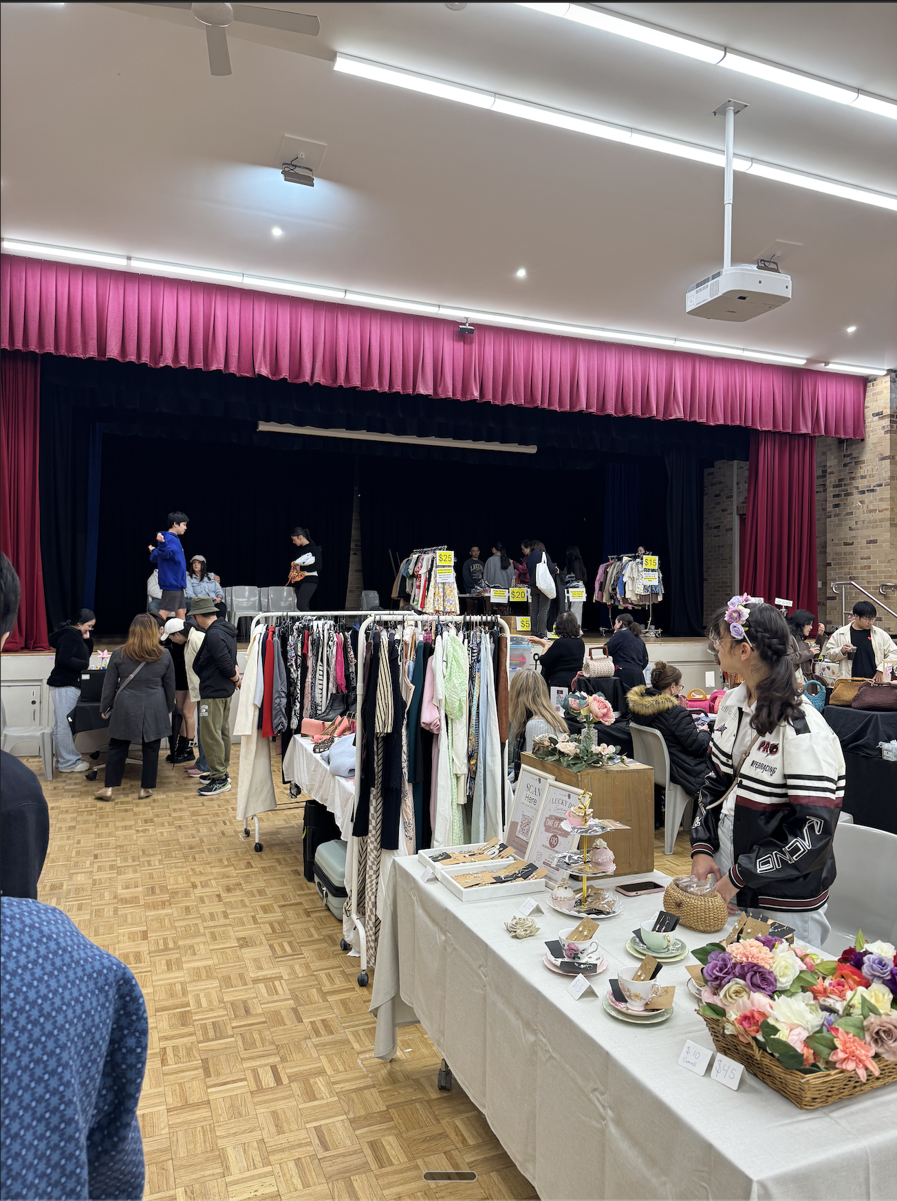 Shoppers browsing stalls at Hills Style Market